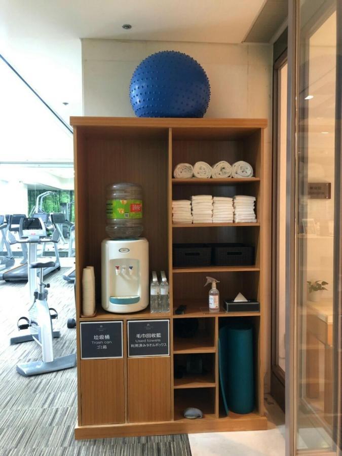Hotel Royal Hsinchu Exterior foto A water dispenser in a gym